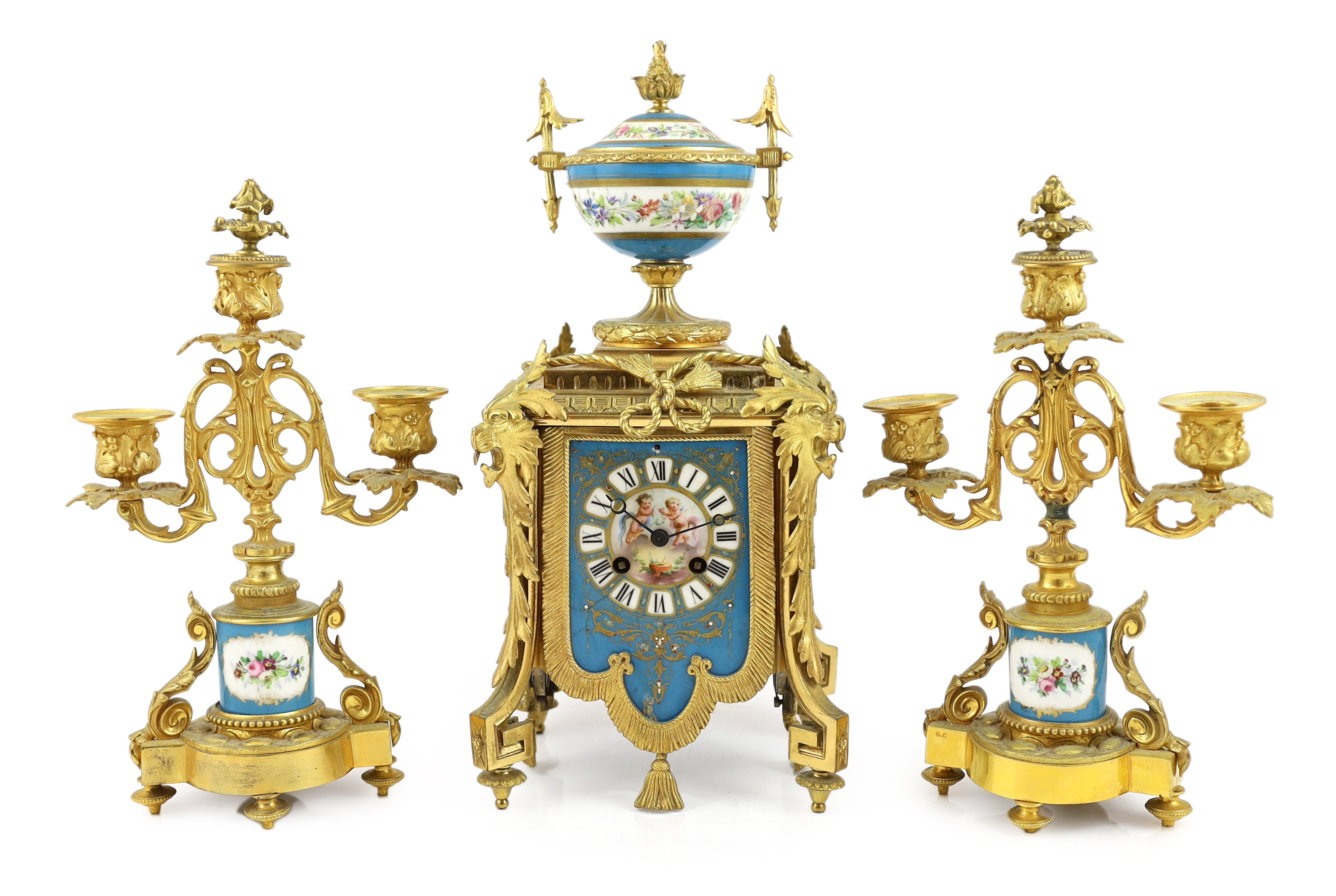 A 19th century French ormolu and Sevres style porcelain clock garniture, clock 19cm wide, 15cm deep, 37cm high candelabra 19cm wide, 30.5cm high